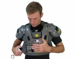 New Balance Referee And Umpire Shoes New Balance Challenger Mock Neck Short Sleeve Compression Shirt -Bats Shop TMMT717 NB Mock chest protetor being strapped on 1